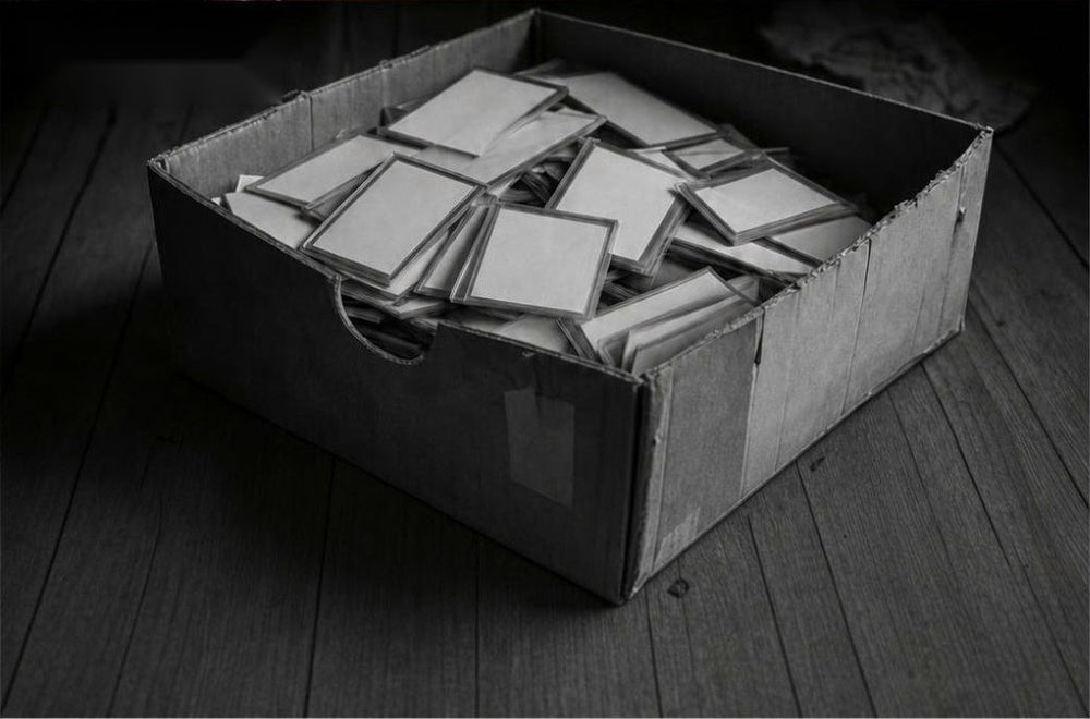 Before: graded cards piled in a cardboard box