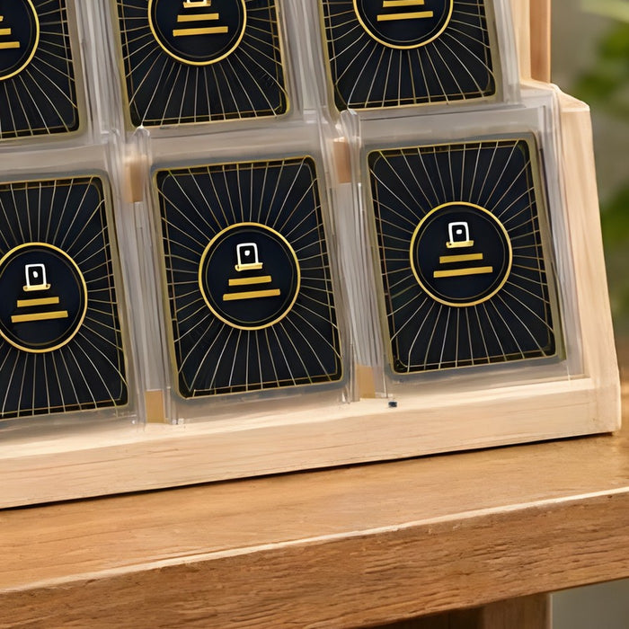 Close-up of graded card slabs seated in the snug-fit slots